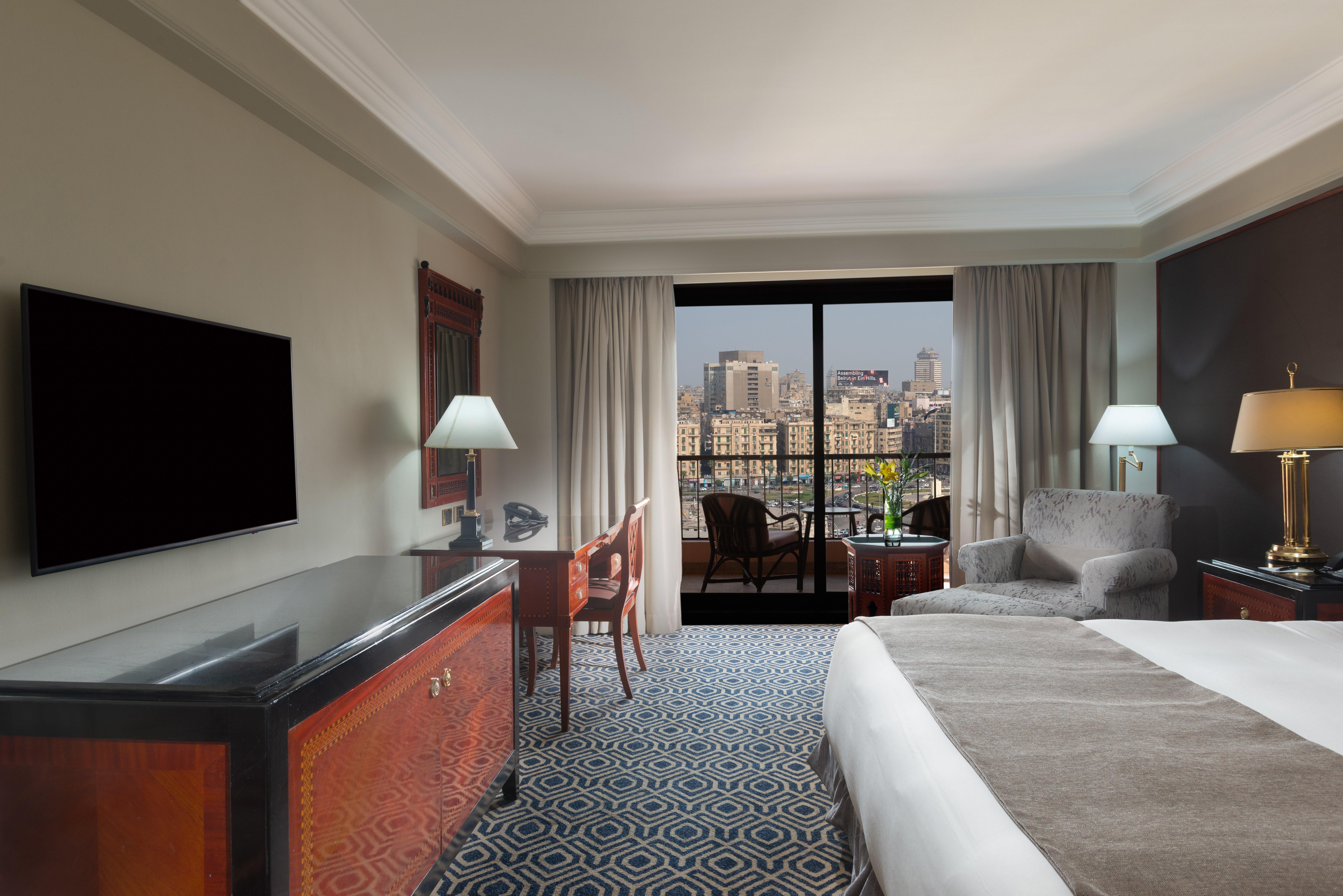 Intercontinental Cairo Semiramis By Ihg Hotel Exterior foto A guest room at the Four Seasons Hotel Cairo at Nile Plaza